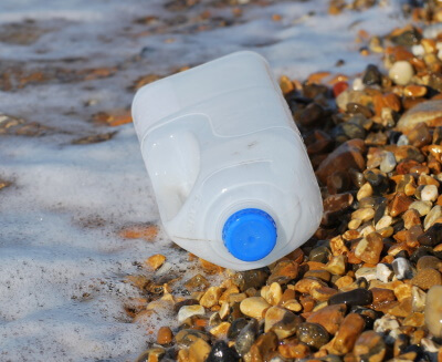 Empty milk bottle washed ashore