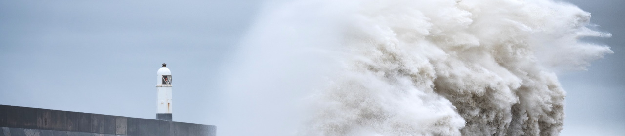 storm hitting lighthouse Porthcawl